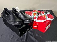 Both pairs on boxes, showing overall view