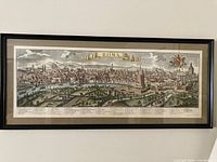 Front view of framed panoramic engraving of Rome