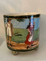 Front view showing children scene and ball feet