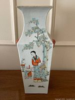 Front view showing court lady and children design on square vase