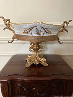 Front view of porcelain bowl on ormolu base