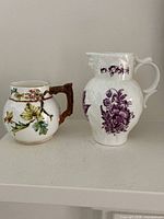 Both creamers side by side on shelf