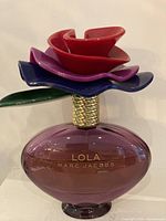 Front view of Marc Jacobs Lola 100ml bottle showing label and overall shape