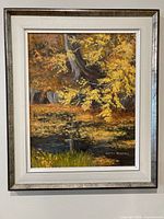 Full view of framed painting showing artwork and frame