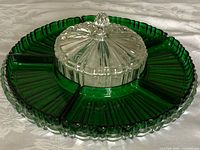 Full assembled relish tray showing green inserts and clear lidded center