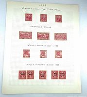 Full album page displaying all mounted stamps under handwritten headings.