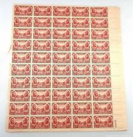 front of full stamp sheet showing stamp designs and plate number selvage