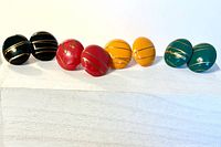 Front view of four color pairs of stud earrings