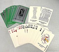 Full spread of card fronts including ace of spades with Bailey Banks & Biddle branding and scoring cards