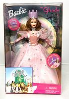 Front view of boxed Barbie as Glinda doll