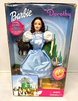 Front view of boxed Barbie as Dorothy doll showing contents and accessories