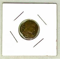 Obverse of fantasy coin in holder