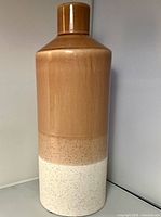 Full front view showing entire vase and glaze pattern