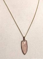 Full view of necklace showing chain and pendant