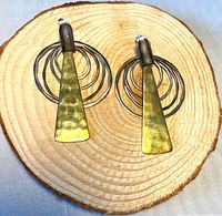 Front view of earring pair on wood slice