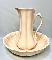 Pitcher standing in washbowl showing overall design and color