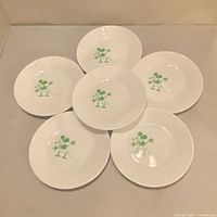 Six plates arranged to show quantity and design