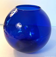 Front view of cobalt blue spherical vase