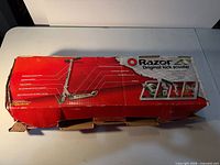 Retail box showing Razor Original Kick Scooter graphics