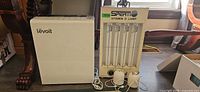 Levoit air purifier, Sperti lamp, two mini humidifiers with cords