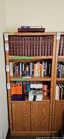 Full view of bookshelf loaded with books