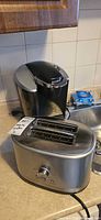 Keurig coffee maker and KitchenAid toaster on countertop