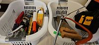 Overview of two baskets with tools and DeWalt bag