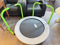 Top view of trampoline with both green balance bars attached