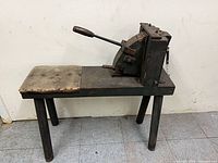 Full view of shrinker stretcher mounted on bench