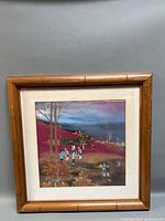 Full view of framed square painting with bamboo-style frame