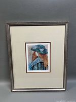 Full view of framed lithograph showing artwork, matting and frame