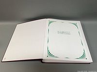 Album open to title page