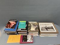 Three stacks of 21 books on ancient Egypt and Africa