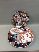 Both Imari chargers front view