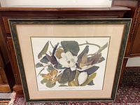 Full view of framed print showing frame, mat and artwork