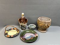 All five pottery and ceramic items grouped