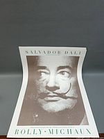 Full poster showing Dali portrait and text