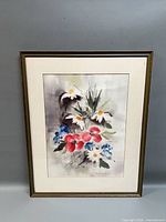 Front view of framed floral watercolor painting