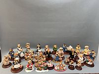 Full group shot showing all 32 bear figurines