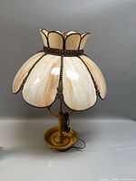 Full view of slag glass table lamp showing shade and base