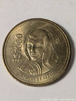 Obverse showing portrait, denomination, year, mintmark