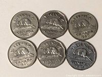 All six Canadian 5-cent coins front (beaver reverse) visible with dates