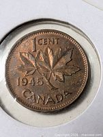Reverse of 1945 Canada 1 cent showing maple leaves and date