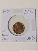 Coin in 2x2 flip showing full view with handwritten details 1971, $6.00, MS65