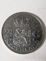 Reverse showing crowned Dutch coat of arms, value 2½ G, date 1970