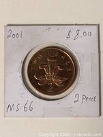 Coin in holder front showing reverse design and annotations