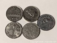 Fronts of all five Canadian 5-cent coins