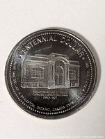 Obverse view showing building and legends