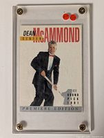 Front view of Dean McAmmond card within clear screw-down case