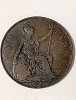 Full view of reverse side showing Britannia, legend ONE PENNY, date 1921